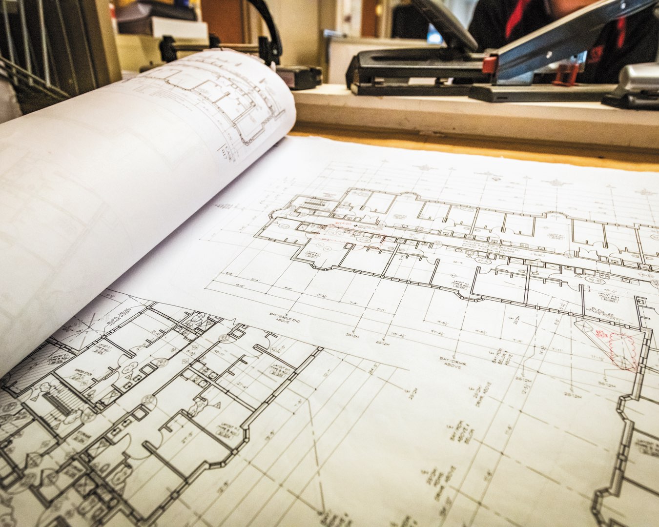 A close-up look at the black-and-white architectural drawings for Villanova’s new residence halls, The Commons