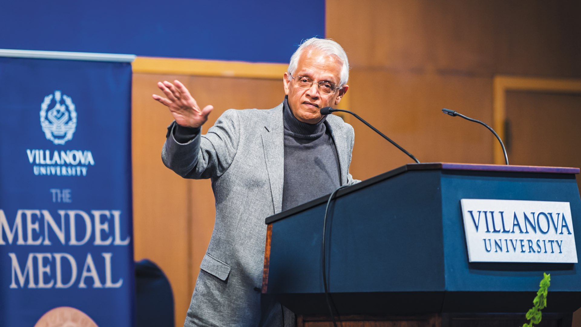 2018 Mendel Medal recipient Veerabhadran Ramanathan, PhD, speaking at a podium at Villanova 