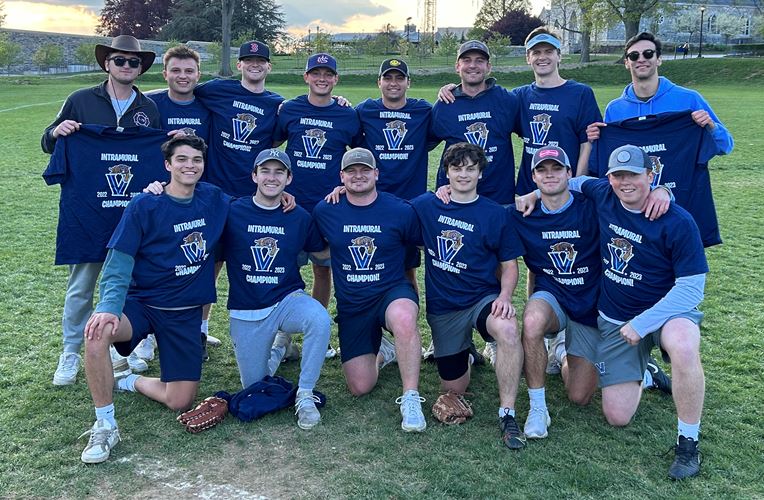 Male students posing for softball champion photo