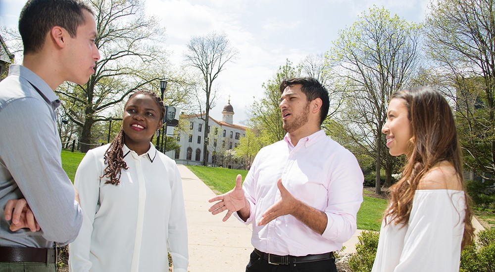 students talking in small group 