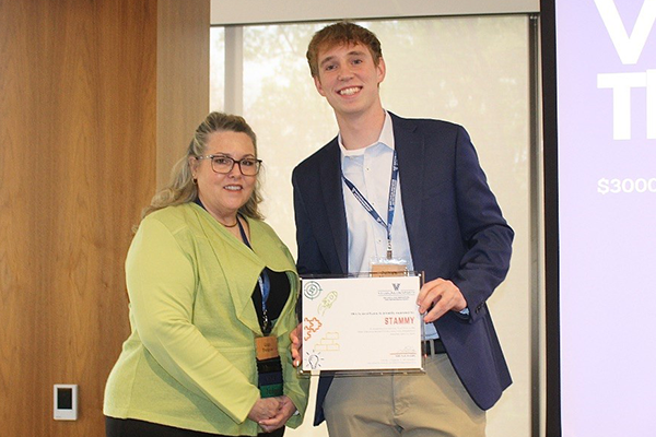 Julian Muncan Accepts Third-Place VSEC Award Julian Muncan Accepts Third-Place VSEC Award