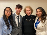 4 presenters pose as group