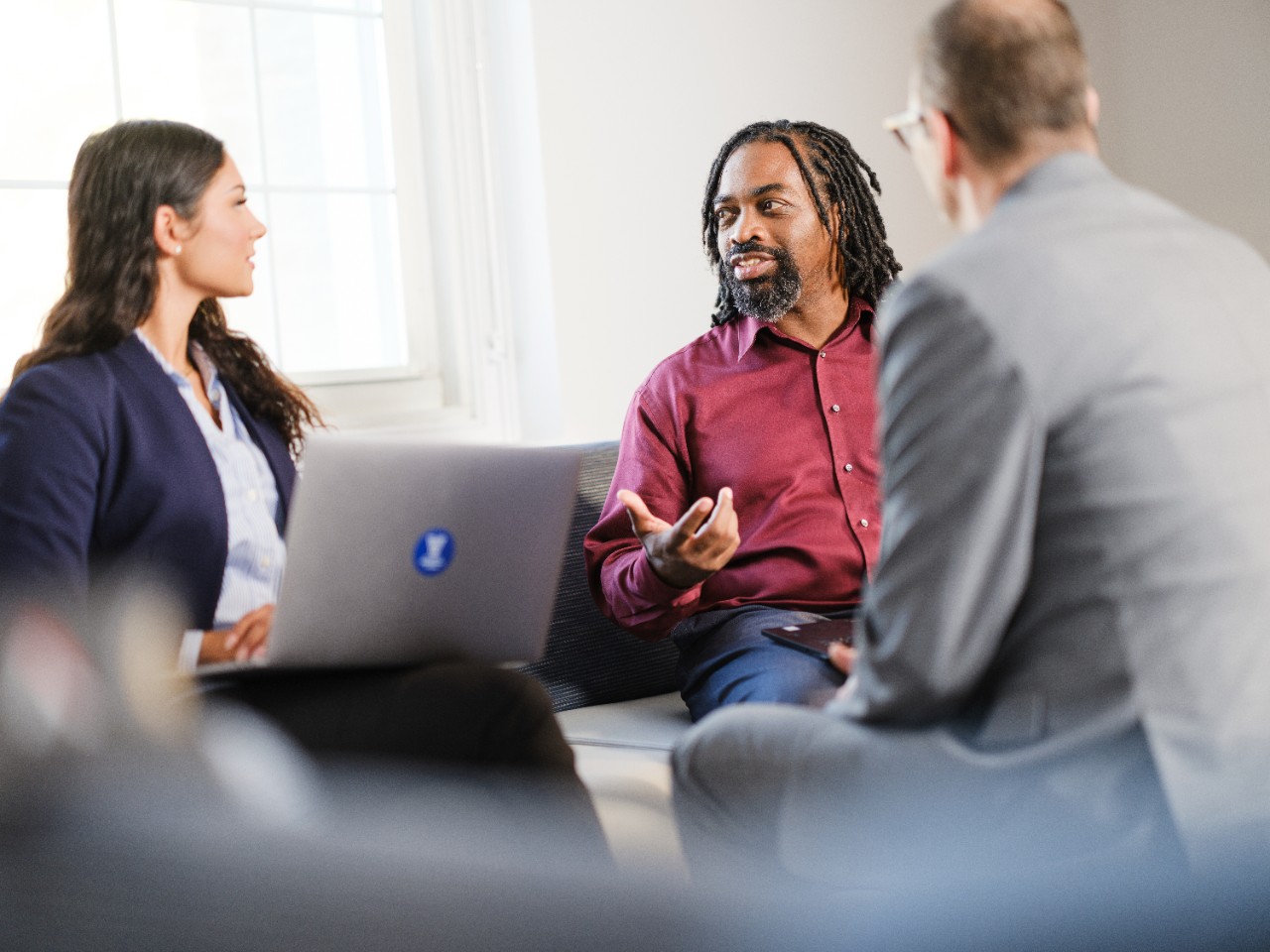 Robert Brickhouse talks with classmates