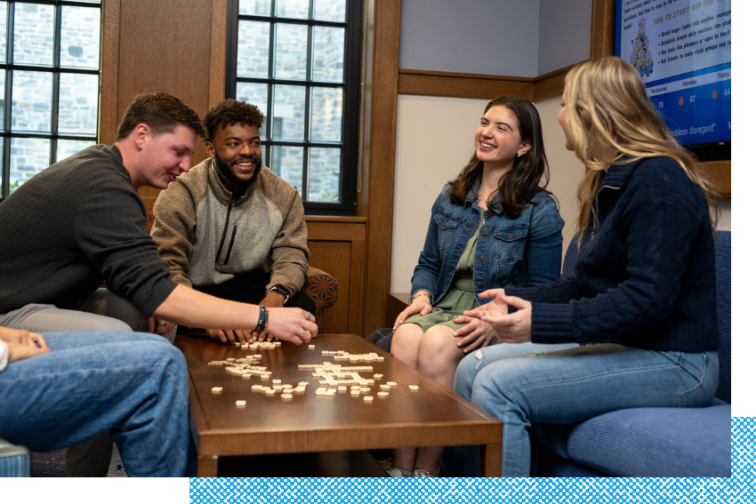 Students playing a game in the Commons